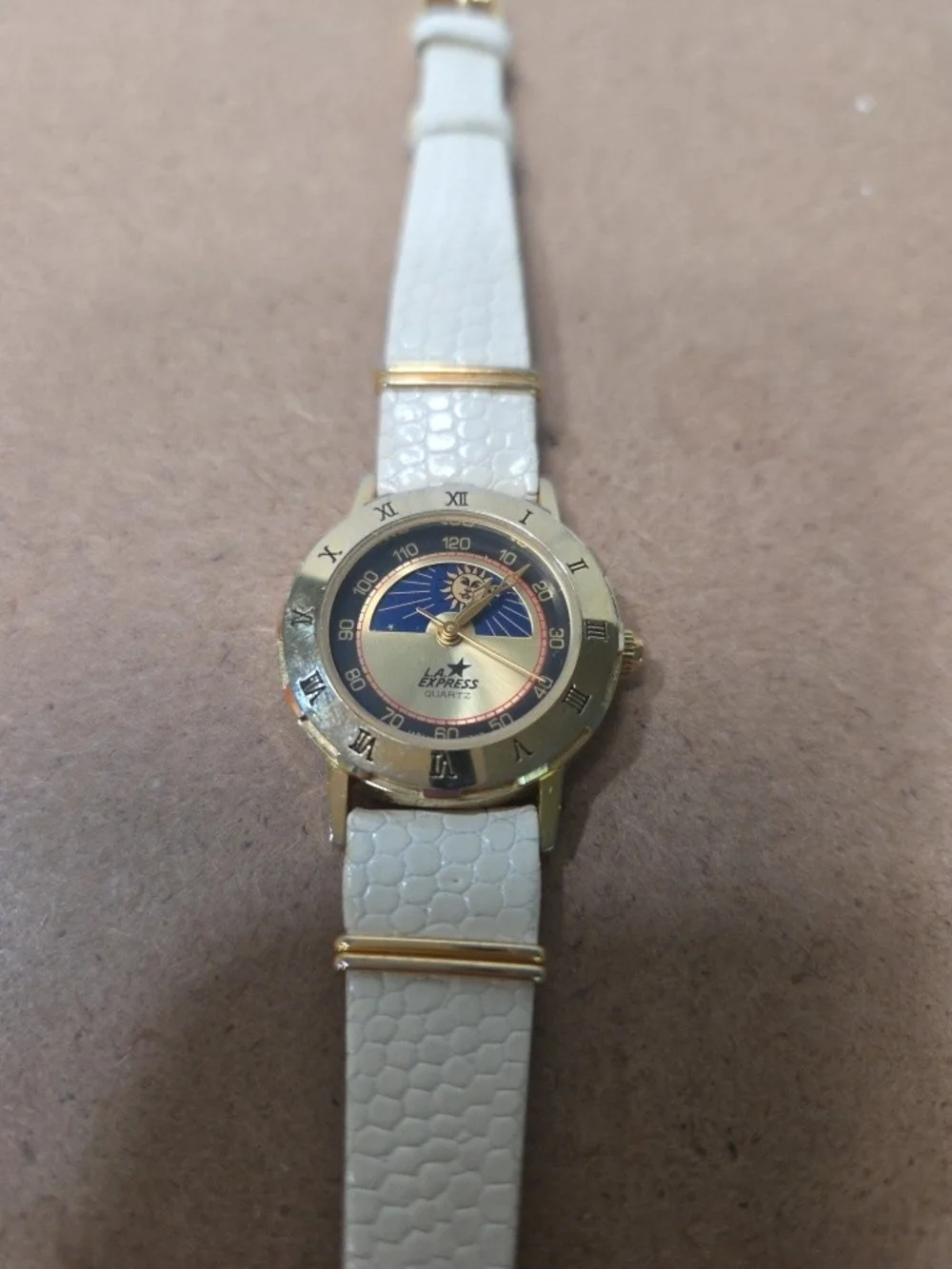LA Express Gold-Tone Quartz Watch with White Strap and Blue Sun Dial